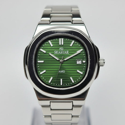 Silver Seastar watch with a green face on a gray background
